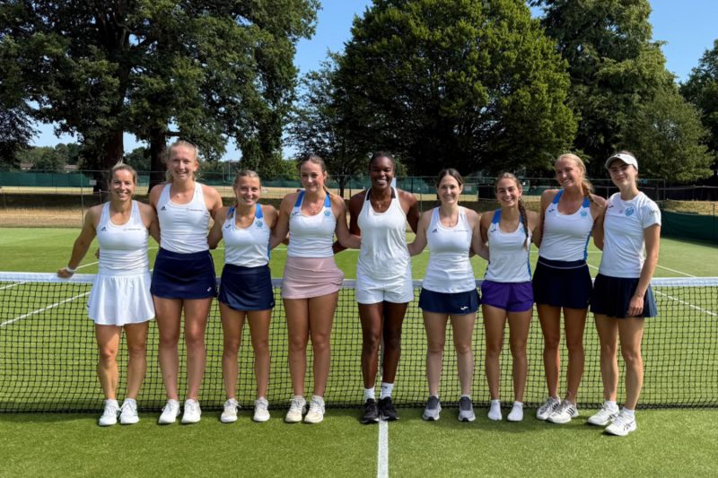 Women on grass tennis court