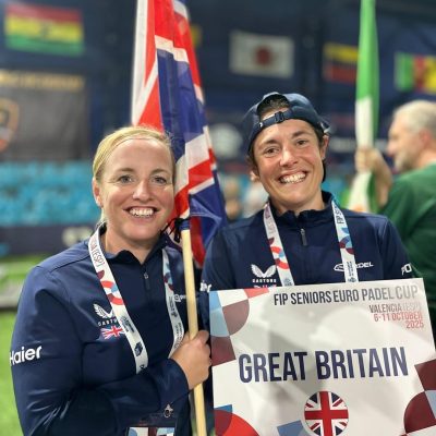 Two women athletes with Great Britain flag
